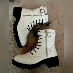 Black and white lace up boots